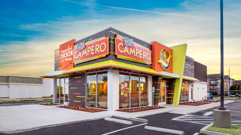 Pollo Campero franchise exterior at sunset
